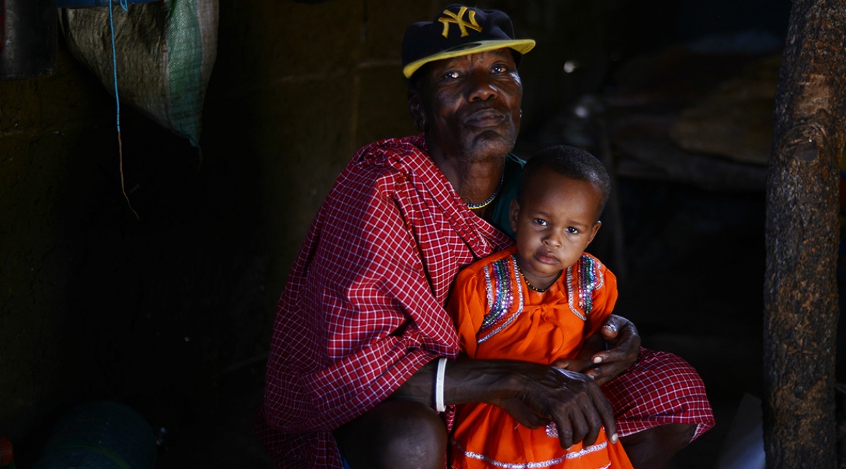 Facing eviction: Barabaig elder Salumu Kundaya Kidomwita, 60, with his two-year-old daughter Mama