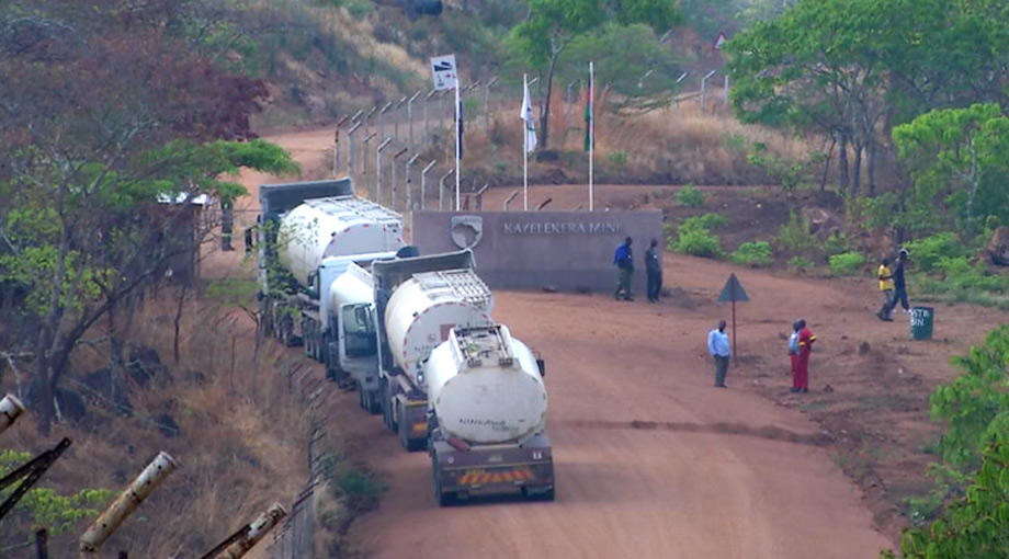 Trucks arrive at a mine in mine in Malawi