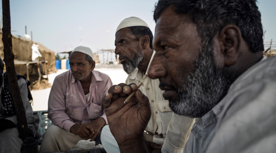Yunus Suleman Gadh and other fisherfolk discuss how the Tata plant has harmed both their livelihoods and their health