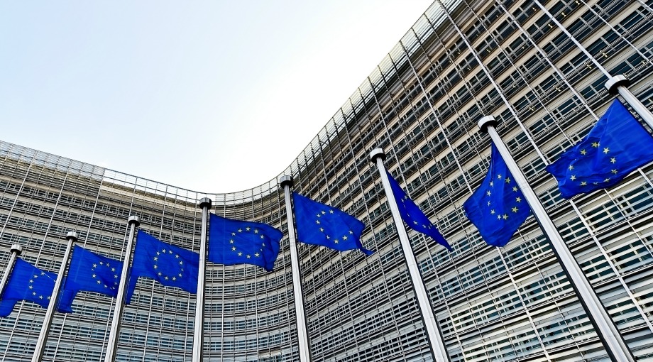 European Union flags float in front of European Commission Headquarters in Brussels