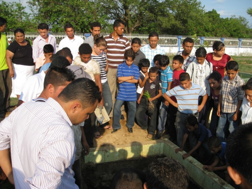 Javier Pulido Zapata, a sugarcane worker who died of chronic kidney disease at age 35, is lowered into his grave at the cemetery in Chichigalpa, Nicaragua