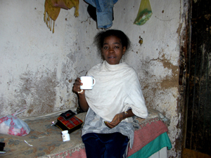 Twenty-year old Michot Sebresilassei takes the antiretroviral drugs she gets through PEPFAR at the local hospital