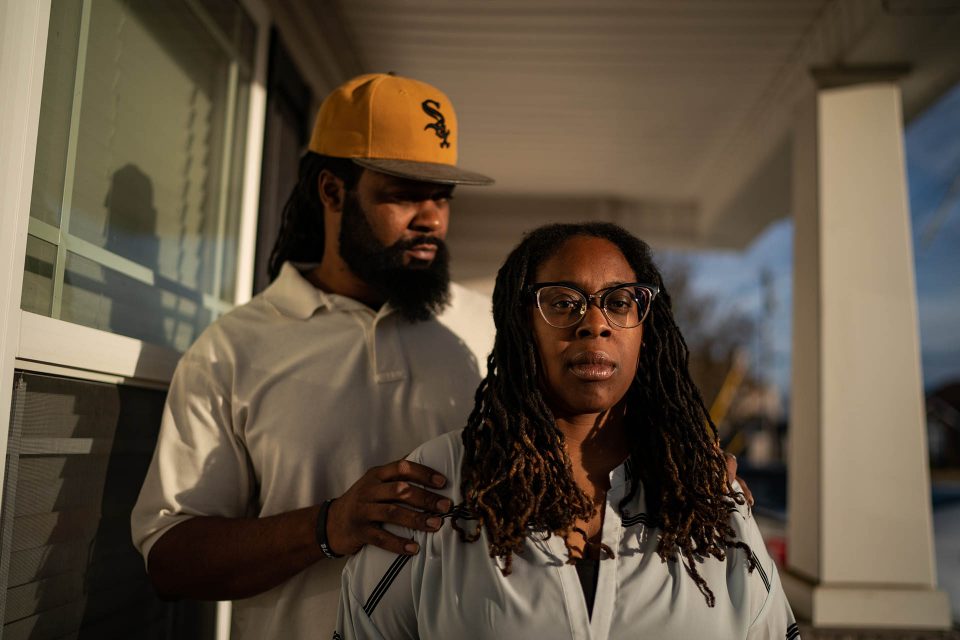 Baltimore family outside their rental home