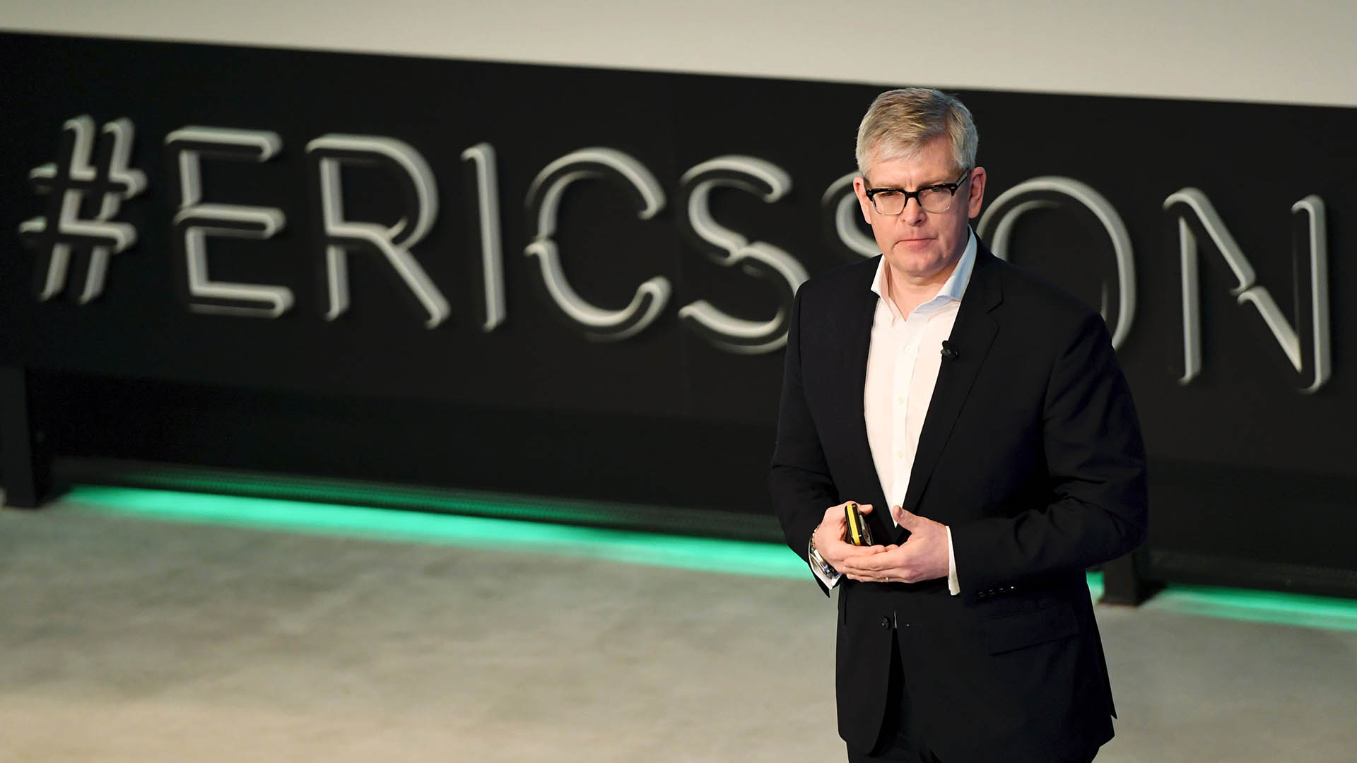 Photo of Ericsson CEO Borje Ekholm in front of an Ericsson sign