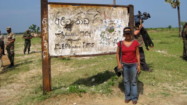 Photo of Namini Wijedasa in a warzone.
