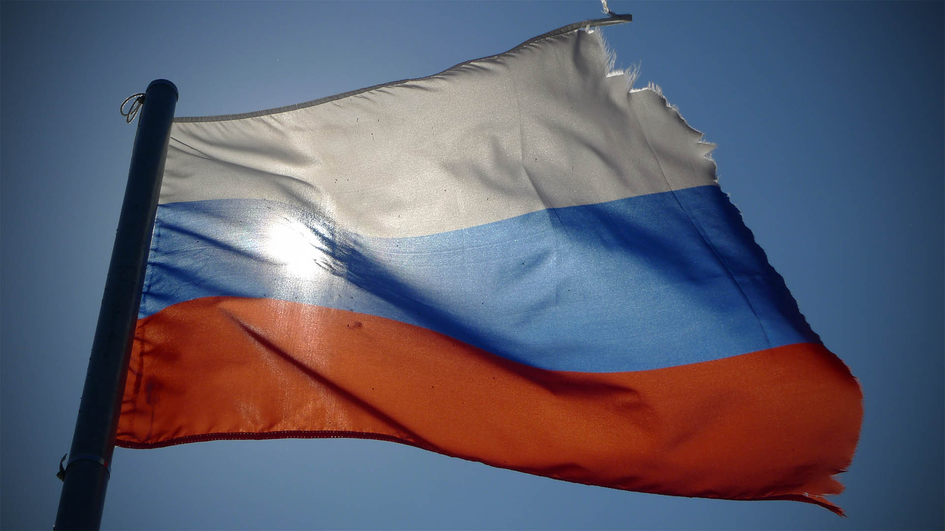 Photo of a torn Russian flag