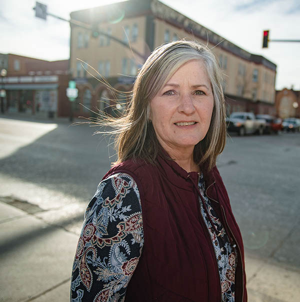 Photo of Dixie Johnson on a street corner in Sheridan WY