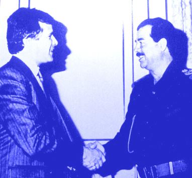 Archival photo of Cardoen and Hussein shaking hands