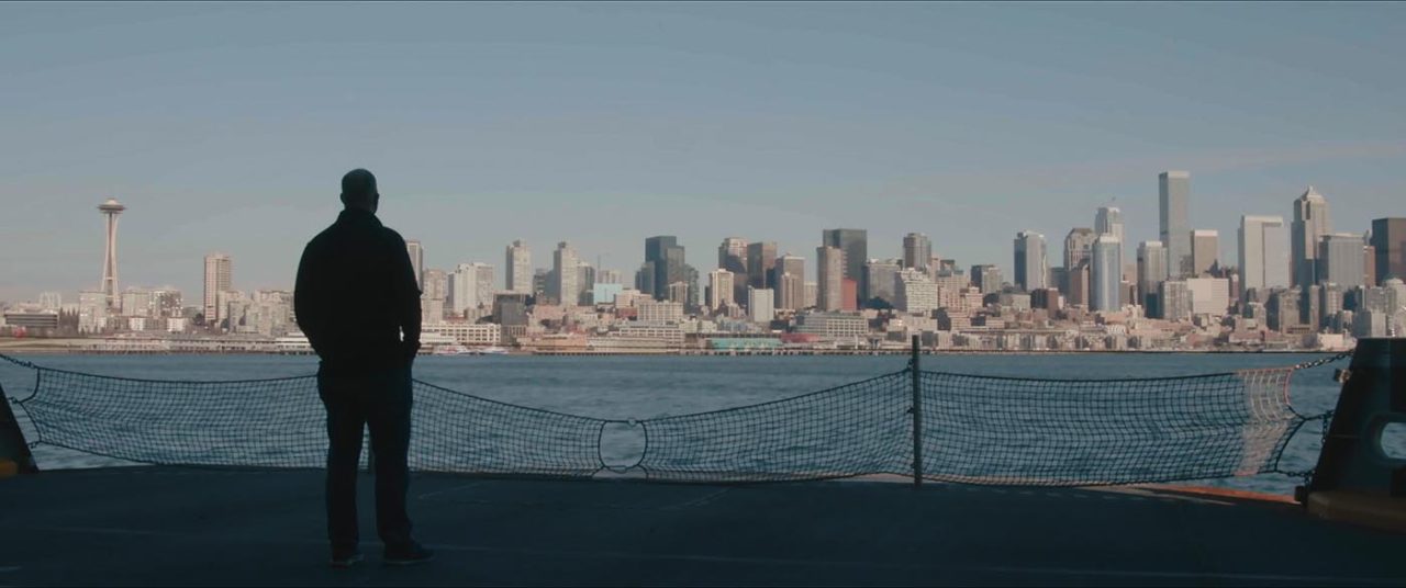 In a still from the film, Ed Pierson looks at the Seattle skyline