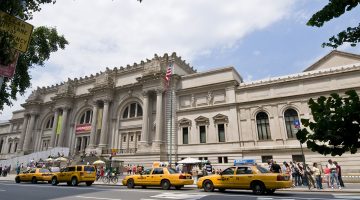 A line of yellow taxis outside the Metropolitan Museum of Art in New York