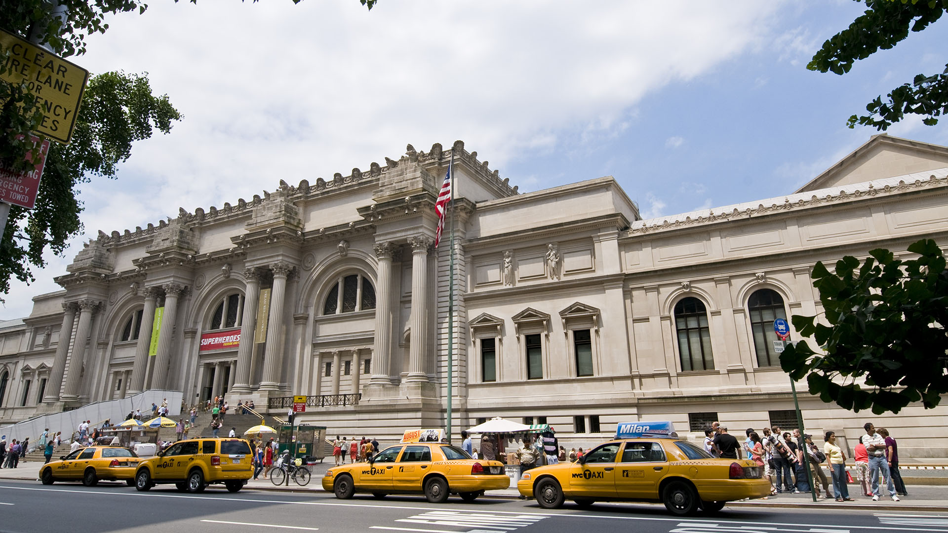 A line of yellow taxis outside the Metropolitan Museum of Art in New York