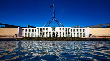 A photo of Parliament House in Canberra on a sunny day