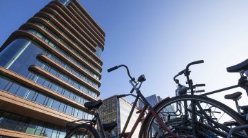 Bicycles parked outside an office building in Amsterdam's financial district, Zuidas