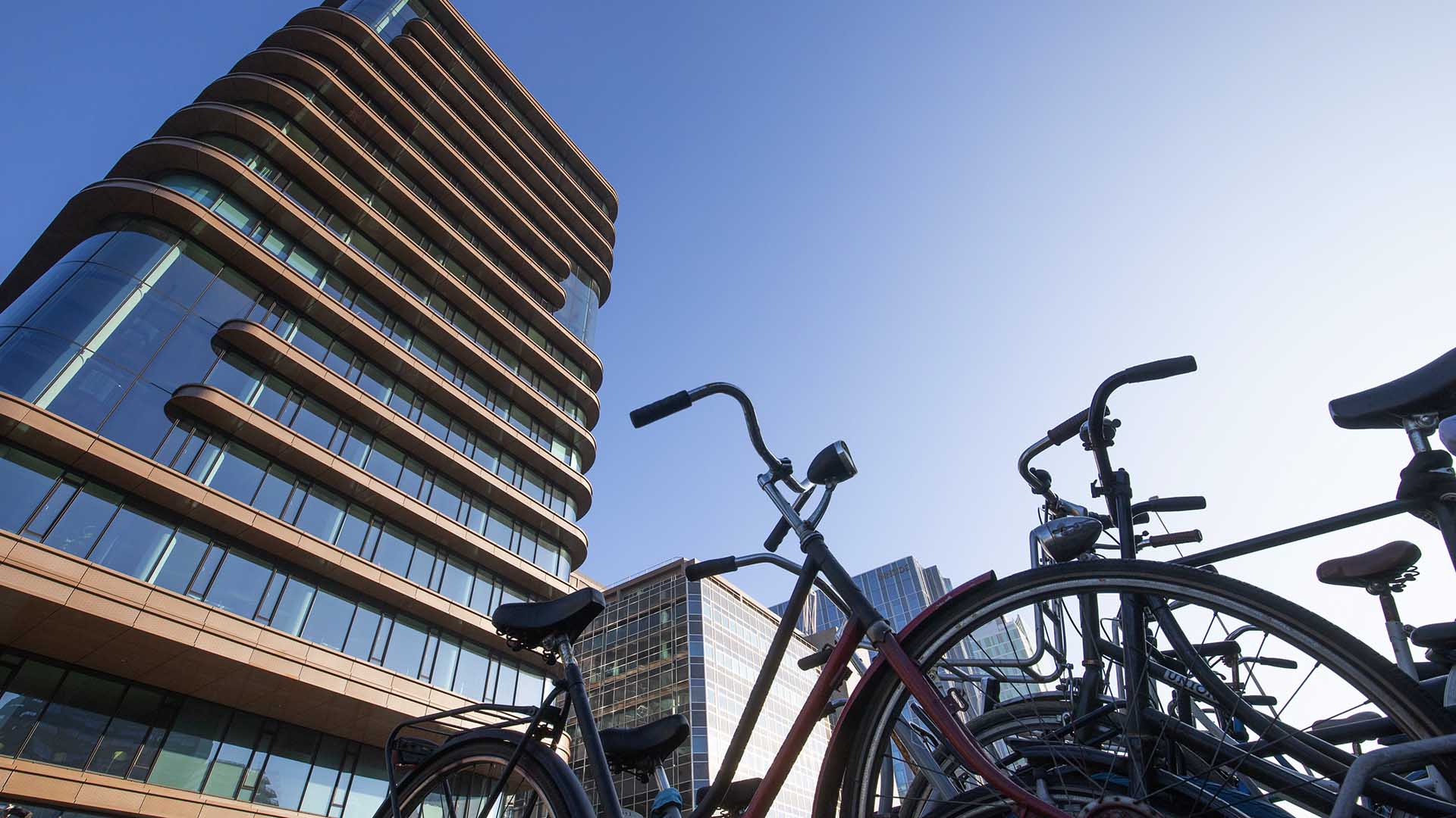Bicycles parked outside an office building in Amsterdam's financial district, Zuidas