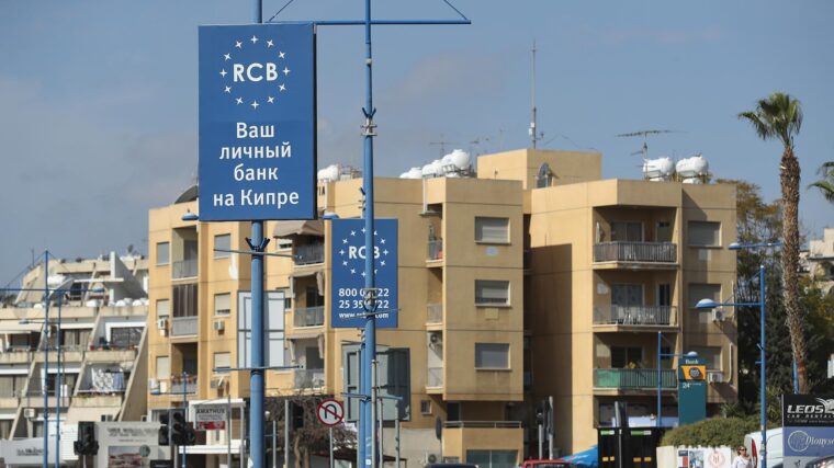 A sign advertises for Russian-owned RCB bank