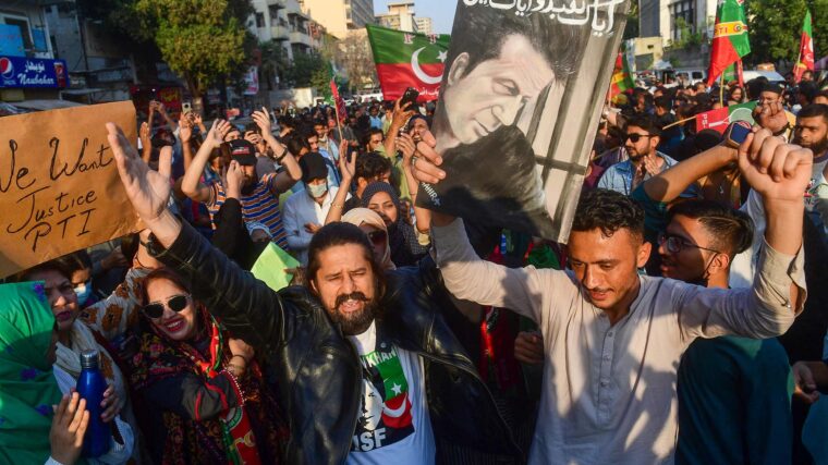 A group of protestors celebrate 