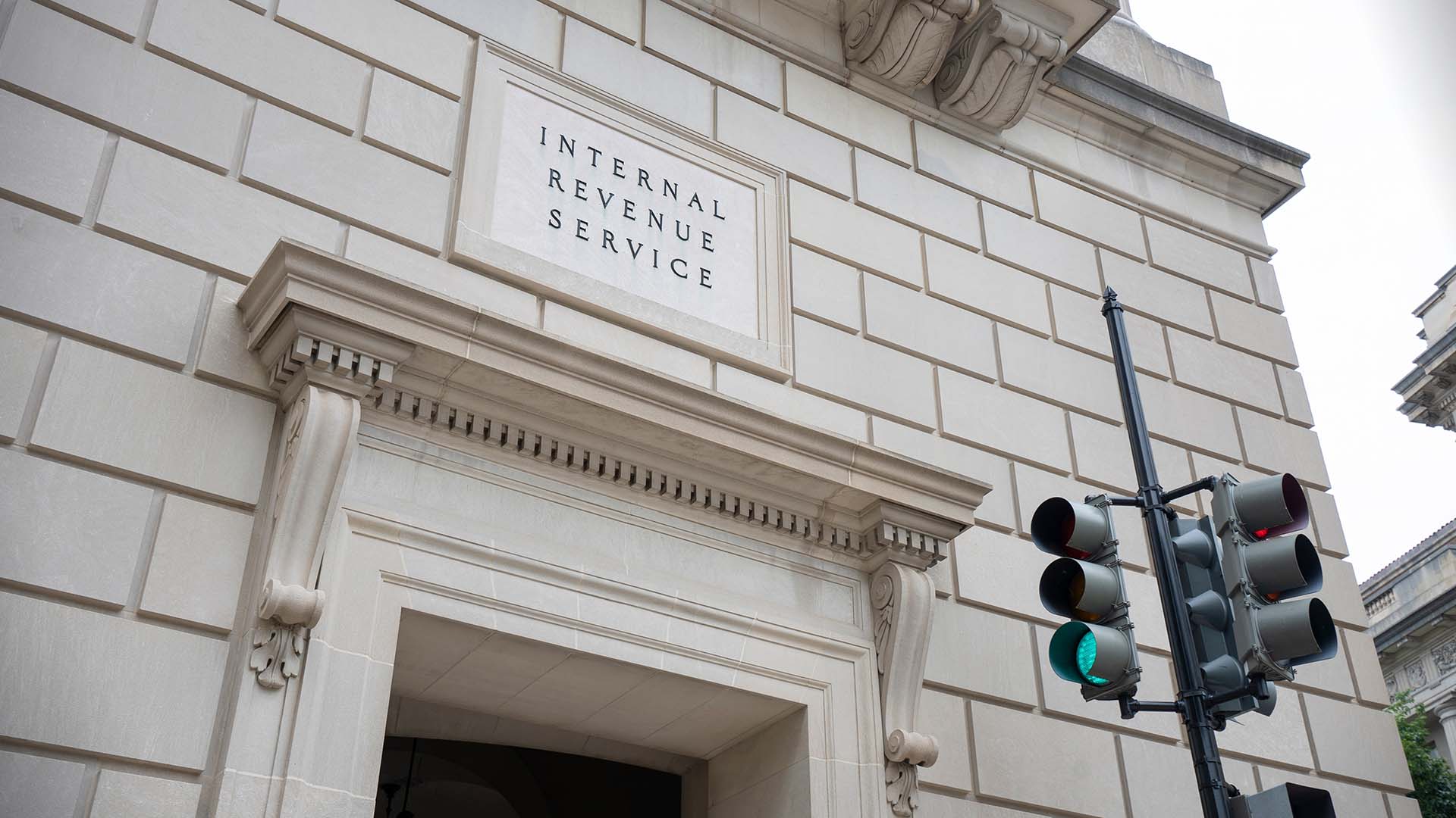 Sign above a building entranceway reads Internal Revenue Service.