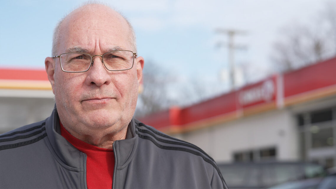 Photo of scam victim Steve Beckett outside a Circle K store.