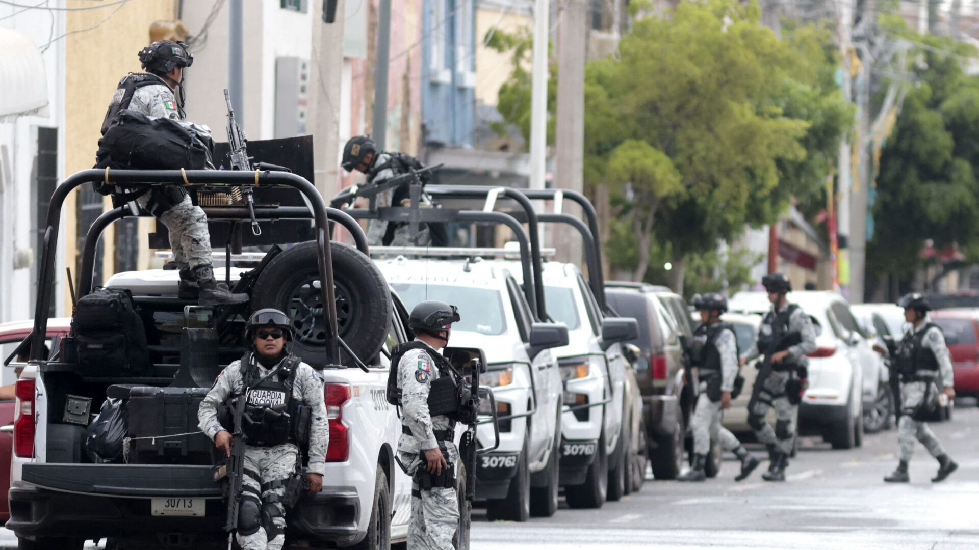 Arizona gun shop owner faces terrorism-related charges for allegedly selling high-caliber weapons bound for Mexican cartels illustration