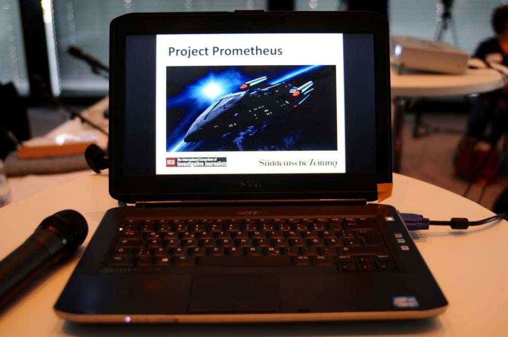 Close up photo of a laptop with the screen displaying a presentation reading 'Project Prometheus'