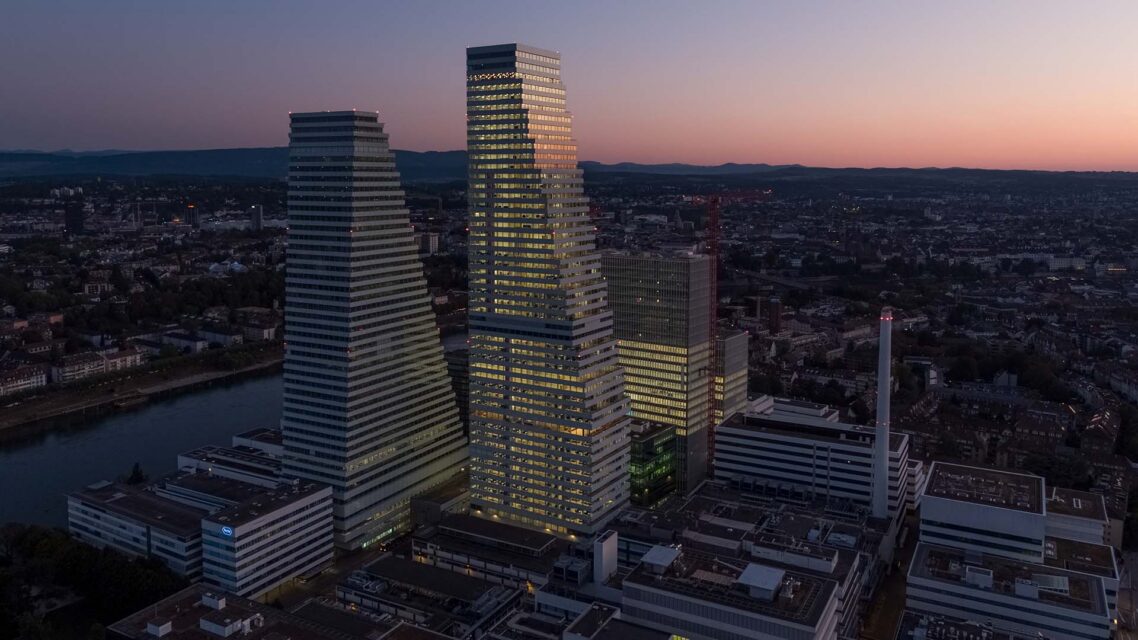 Photo of Roche's Basel headquarters at dusk