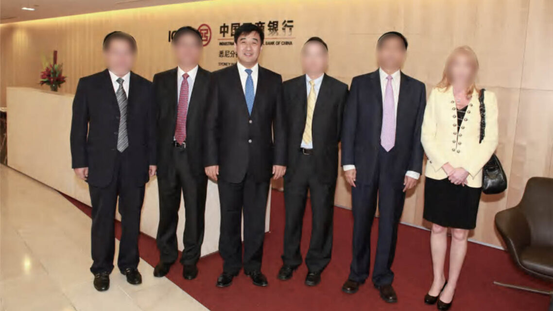 Photo of six people, including Zhang Hongli